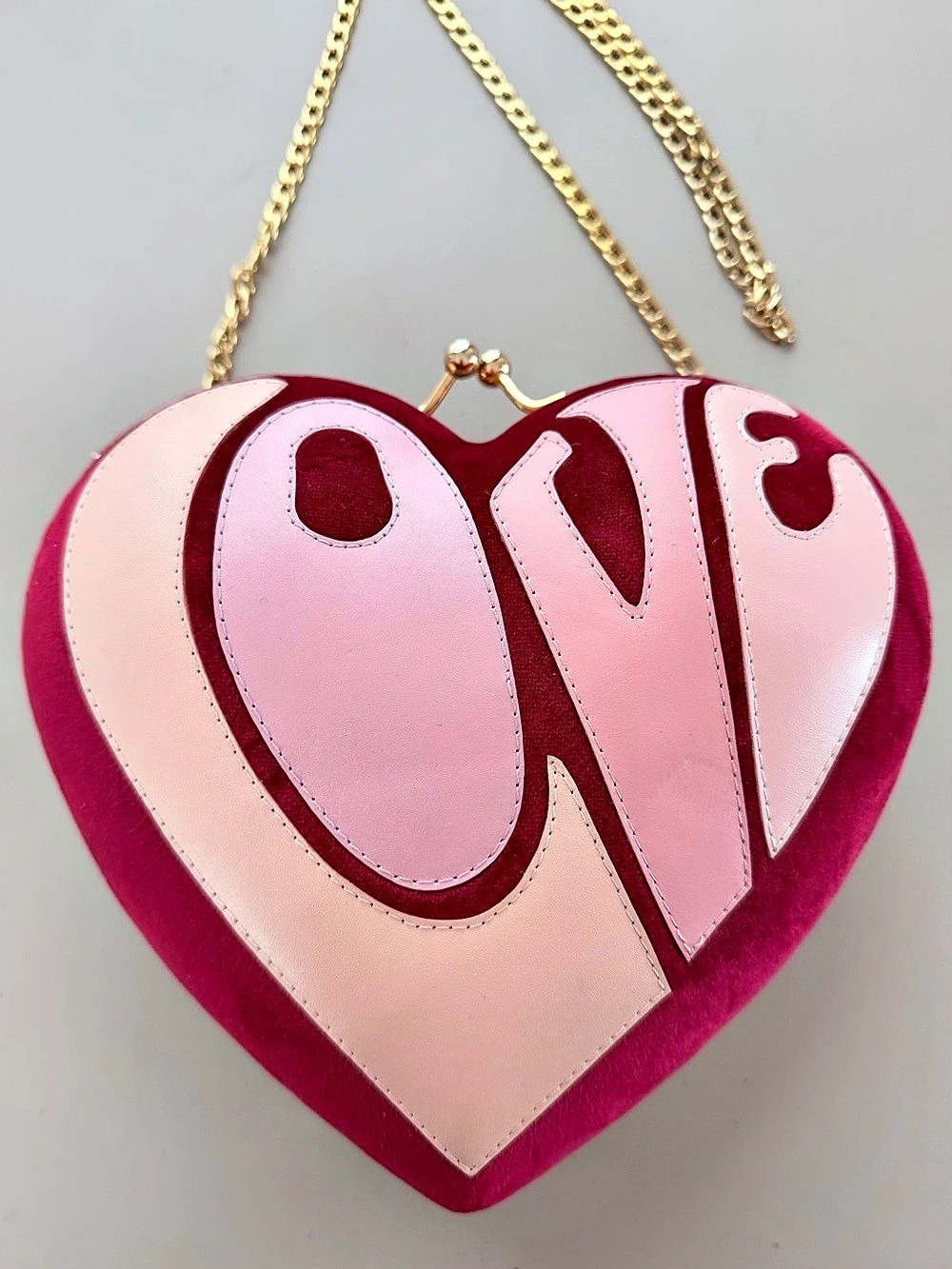 Butrich love heart Clutch
